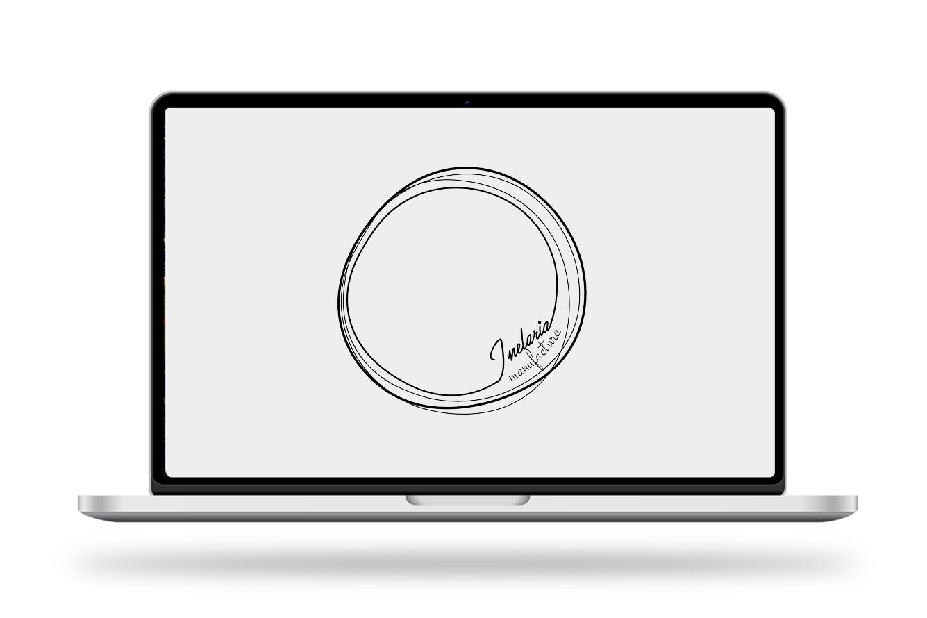 Laptop displaying a circular logo written inside.